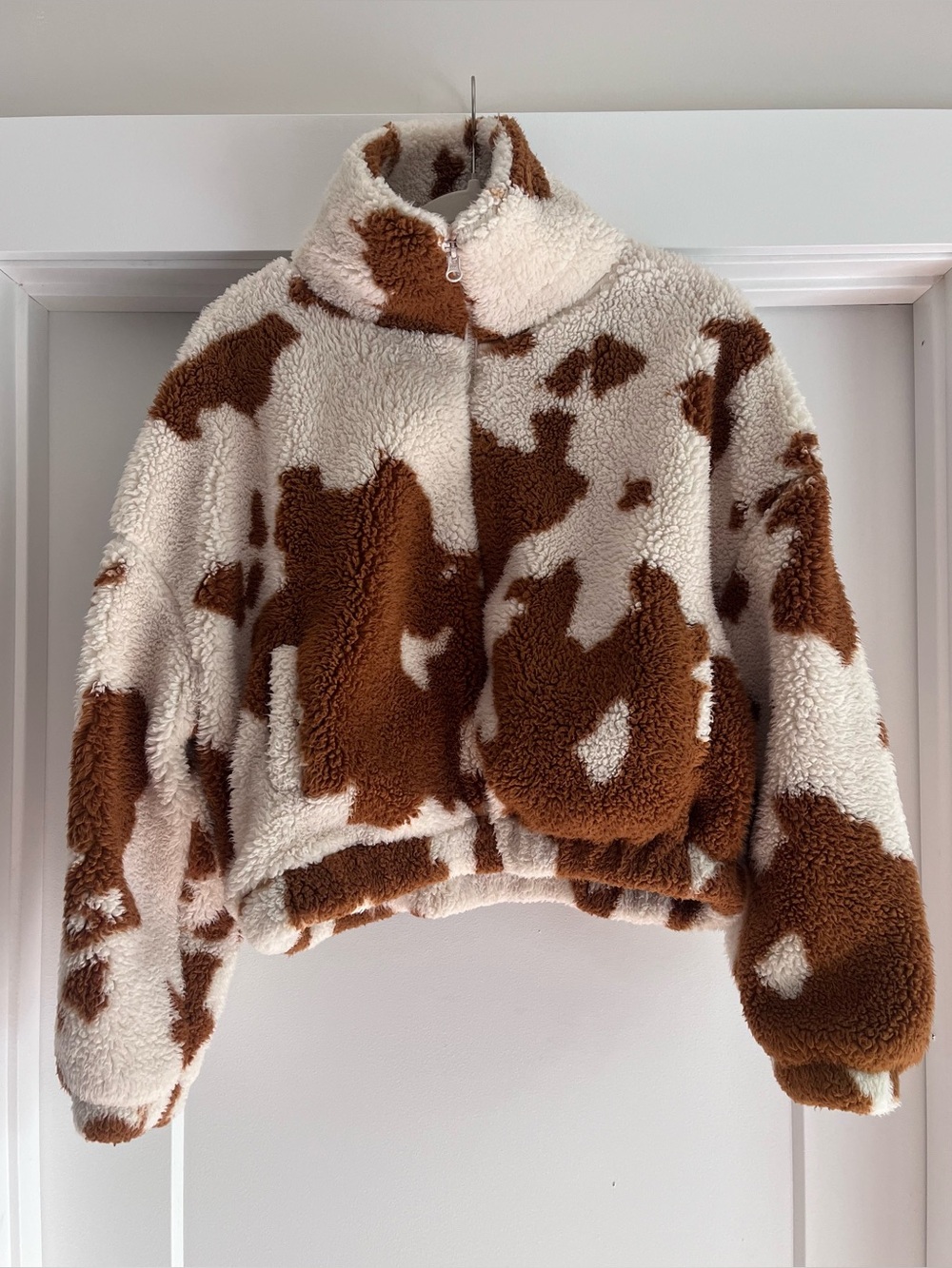 Urban outfitters cow print Sherpa jacket